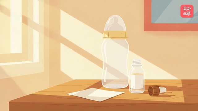 접어 둔 흰 거즈와 작은 점적 용기, 소독한 젖병이 놓인 그림